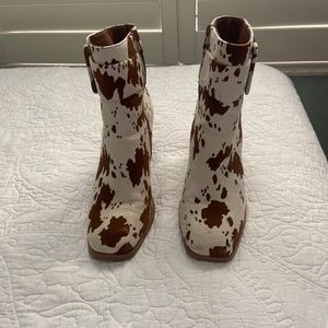 Cow print heeled booties